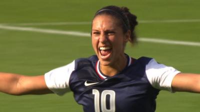 Carli Lloyd celebrates scoring against France