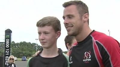 Tommy Bowe meets a fan at the City of Derry Rugby Club