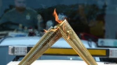 Olympic torch 'kiss'