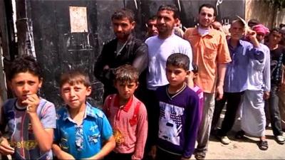 Food queues in Aleppo