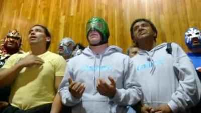 Some of the lucha libre wrestlers in church