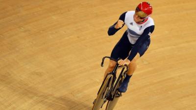 Chris Hoy celebrates as Great Britain win gold in team sprint