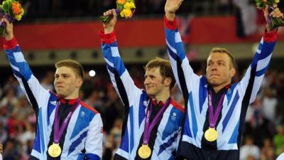 Philip Hindes, Jason Kenny and Sir Chris Hoy celebrate gold in team sprint.