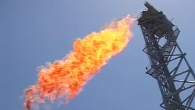 Flame spewing from off shore oil drill