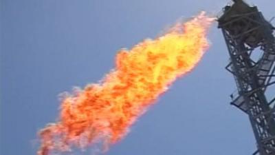 Flame spewing from off shore oil drill