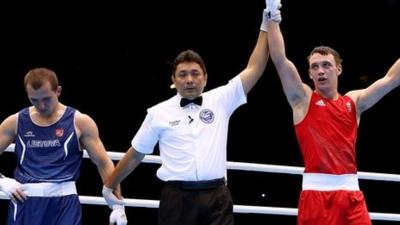 Freddie Evans celebrates after defeating Egidijus Kavaliauskas