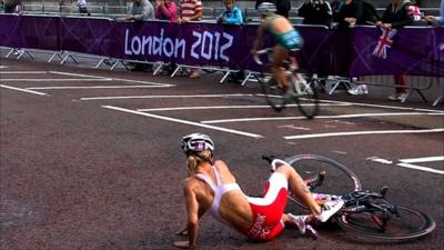 Maria Czesnik of Poland crashes her bike