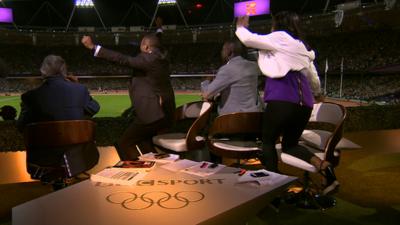 BBC commentators Colin Jackson, Michael Johnson and Denise Lewis can hardly contain their excitement