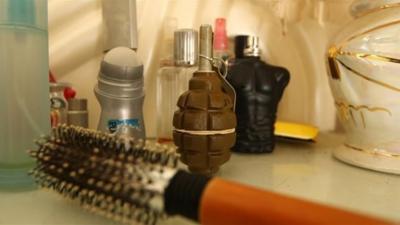 A grenade amongst toiletries