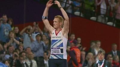 Greg Rutherford getting the crowd behind him