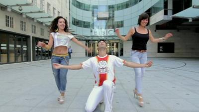 Samba dancers in front of BBC's New Broadcasting House in London