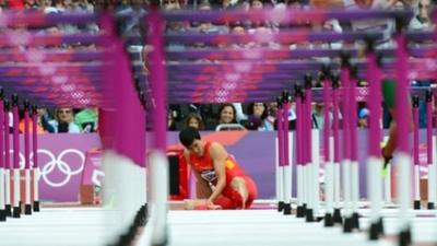 China's former Olympic gold medal winner and world record holder Liu Xiang is out of the 110m hurdles after clattering into the first hurdle in his heat at the London 2012 Olympics