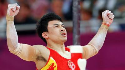 Feng Zhe wins parallel bars gold