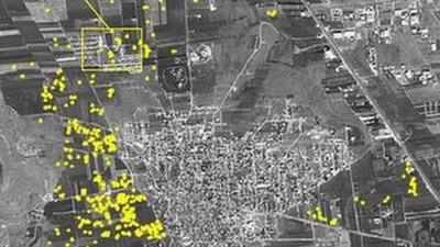 An Amnesty image allegedly showing probable artillery impact craters - represented with yellow dots - in Anadan, near Aleppo