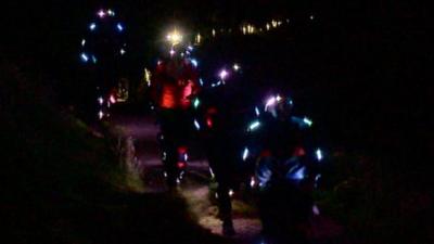 Runners on Edinburgh's Arthur's Seat