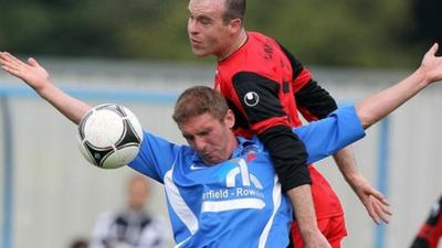 Match action from Ballinamallard United against Dungannon Swifts