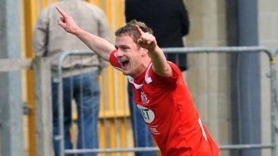 Jamie Tomelty celebrates his goal against Lisburn Distillery