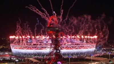 Olympic Stadium lit up with fireworks