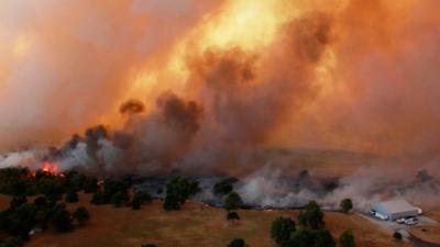 Fires rage in US