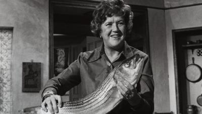 Julia Child holding a fish