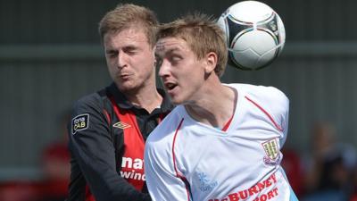 Match action from Crusaders against Ballymena United