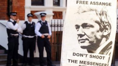 Police outside the Ecuadorean embassy in London