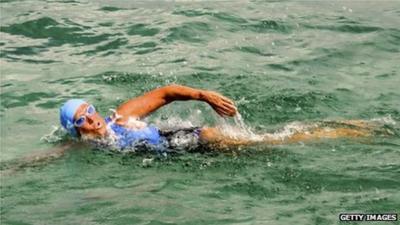 In this handout photo provided by the Florida Keys News Bureau, Diana Nyad begins her swim on August 18, 2012 in Havana, Cuba