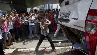 Japanese-branded police car smashed in Shenzhen. 19 Aug 2012