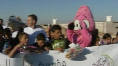 Refugees celebrate eid on Syrian border