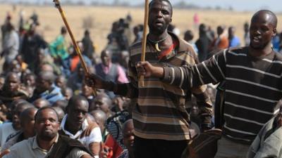 South African miners at the Marikana mine (image from 18 August 2012)