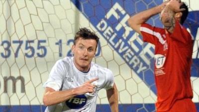 Coleraine's Mark Gillan celebrates after scoring the winner against Portadown at Shamrock Park