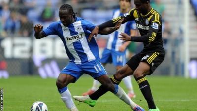 Wigan forward Victor Moses (left) in action against Chelsea