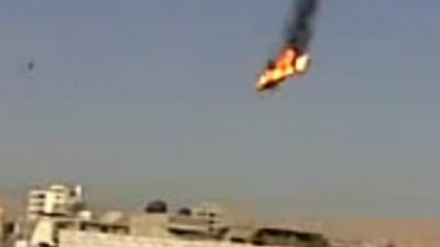 Still from unverified amateur footage, 27/08/12, purporting to show a helicopter in flames after being shot by rebels in the Al Qabun area of Damascus