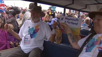 Weymouth greets Paralympic flame ahead of sailing events