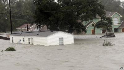 Homes are flooded as Hurricane Isaac hits Wednesday, Aug. 29, 2012, in Braithwaite