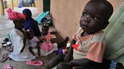 Malnourished children outside hospital in Gao, Mali