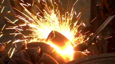 Sparks flying at metal-works factory