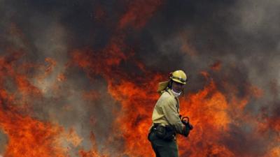 Firefighter in Ojen, southern Spain