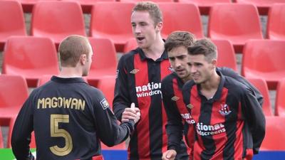 Timmy Adamson celebrates scoring the winning goal with team-mates