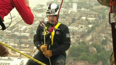 Prince Andrew begins abseil down Shard