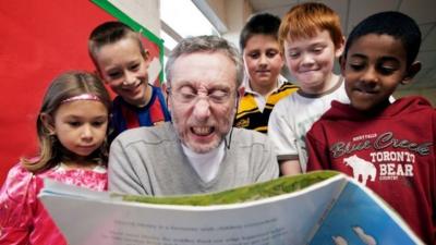 Author Michael Rosen reading to children in the programme 'Just Read'