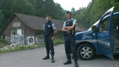 Gendarmes at crime scene in Annecy, France