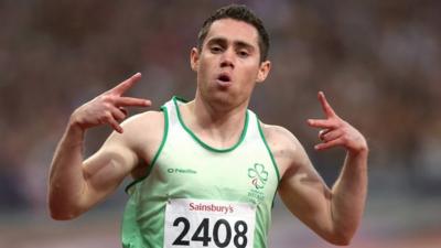 Jason Smyth celebrates after clinching his second gold medal at the Paralympics