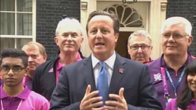 Prime Minister David Cameron with Games Makers outside 10 Downing Street