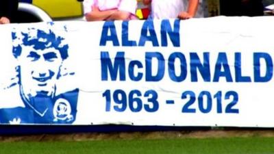 Poster at the Alan McDonald memorial match