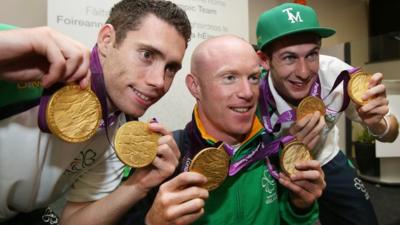 Paralympic champions Jason Smyth, Mark Rohan and Michael McKillop show off their gold medals