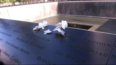 Flowers placed at 9/11 memorials