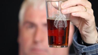 Man with glass of ale