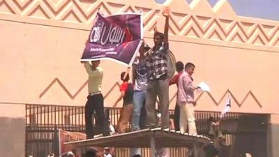 Protester waving flags