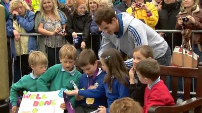 British tennis number one Andy Murray meets some school pupils from Dunblane